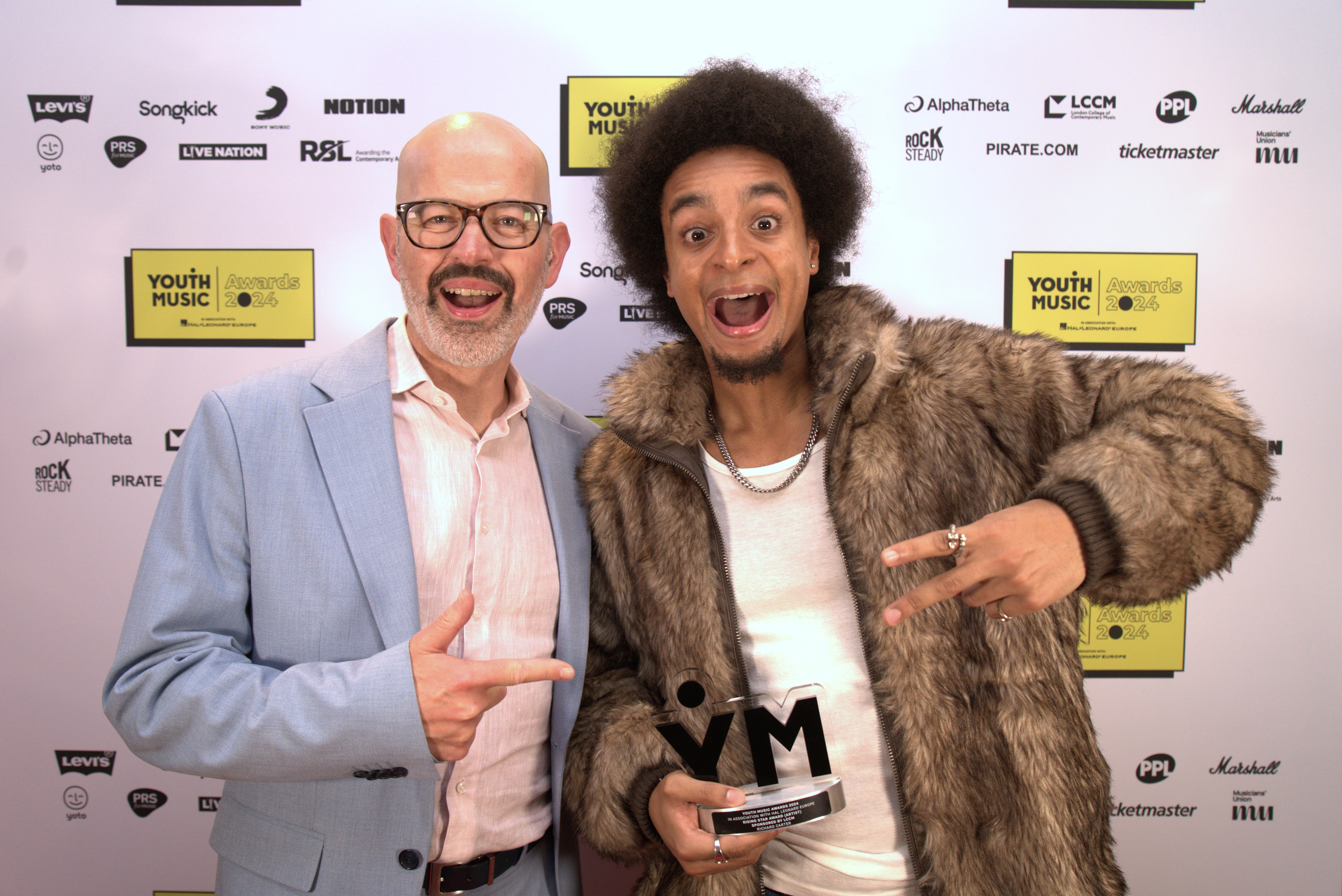 Anthony Hamer-Hodges and Rising Star Award (Artist) sponsored by LCCM winner Richard Carter at the Youth Music Awards 2024