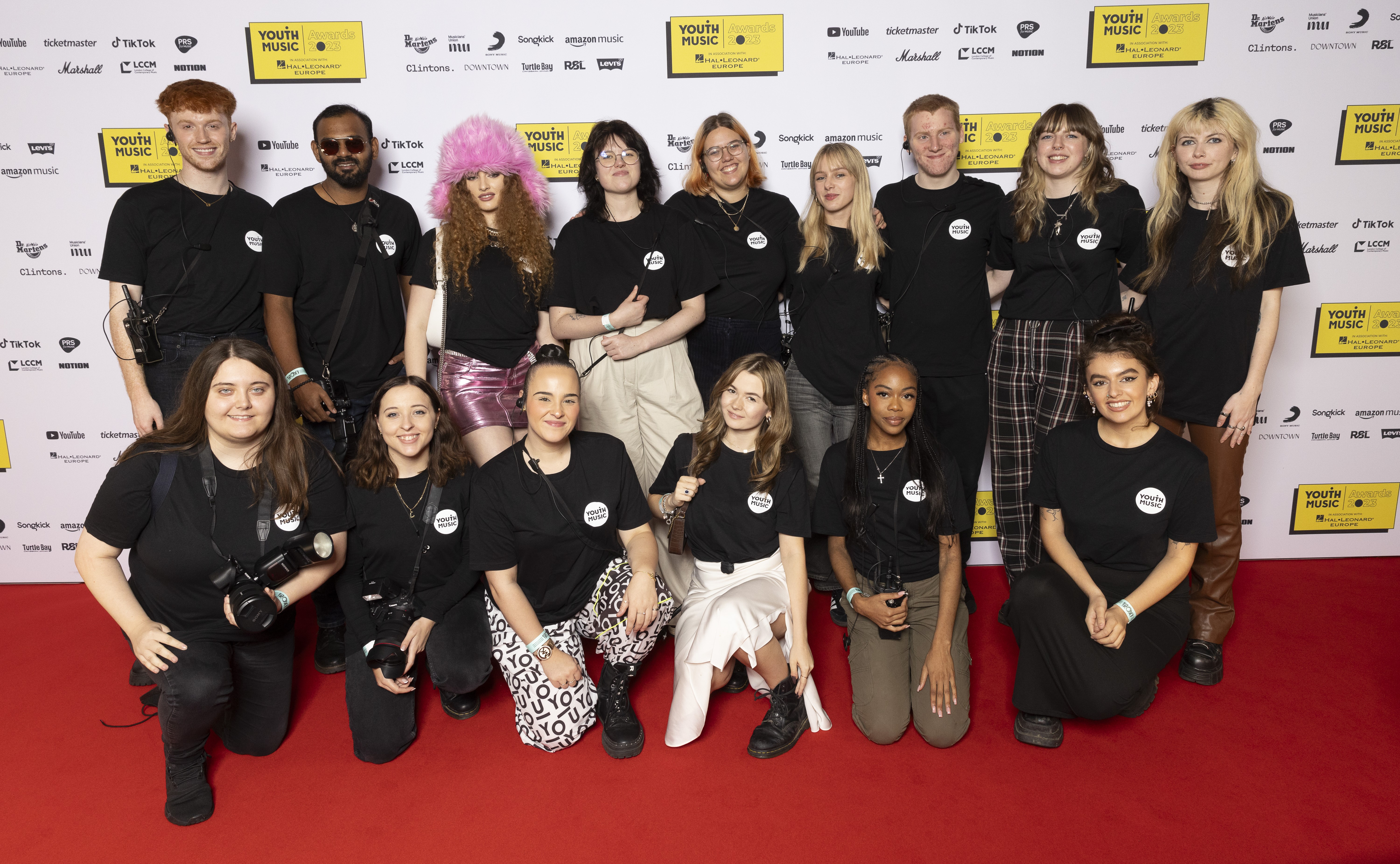 youth music nextgen pose on the red carpet