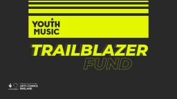 a black and yellow banner advertising the youth music trailblazer fund