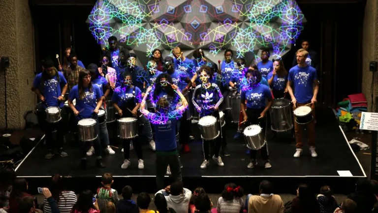 A group of drummers on stage at the barbican 