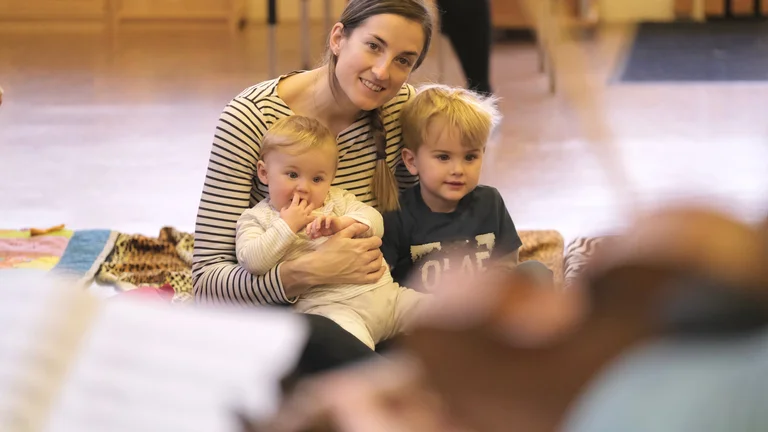 two early years children in a musical activity 