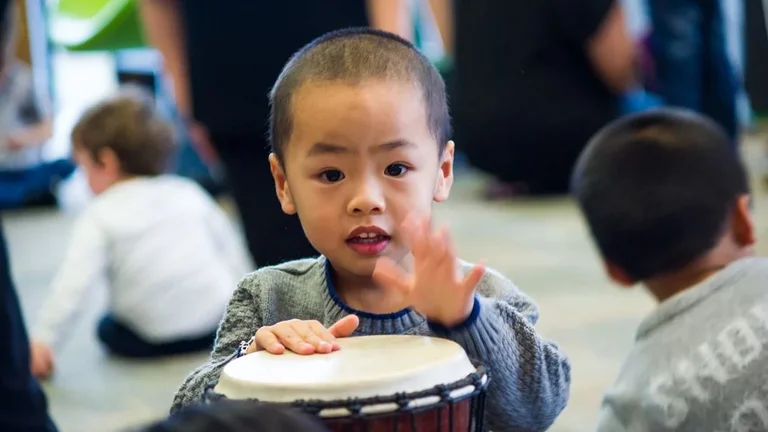 Child playing drums