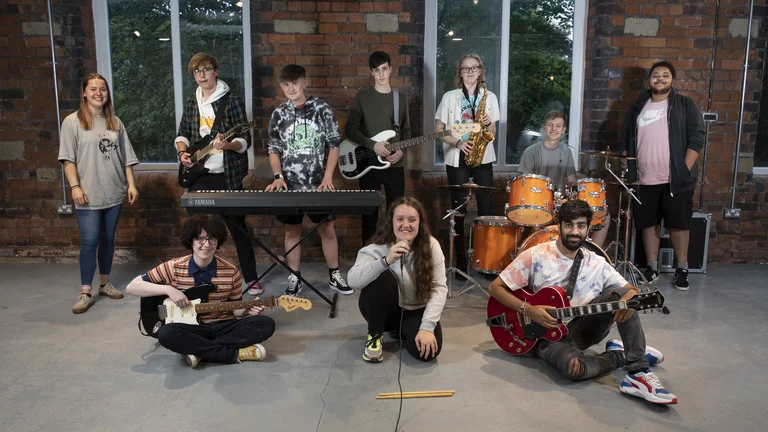 Music band led by nine young people with instruments