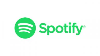 the spotify logo, which is written in green text, and a green circle with three lines cut out of it 