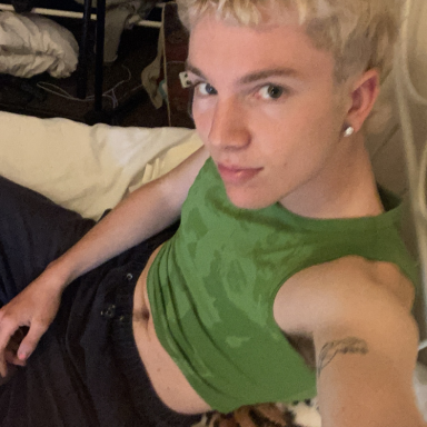selfie of binboss with blonde hair wearing green top