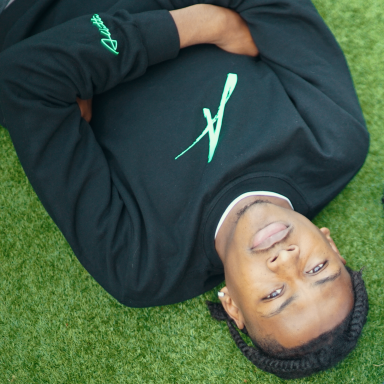 Donae upside-down lying on grass