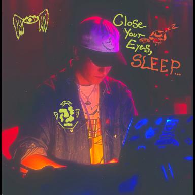 Bawler playing music wearing a denim jacket and hat