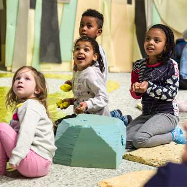 several toddlers at the herd theatre